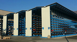 Cantilever racking with roof, rack-clad building
